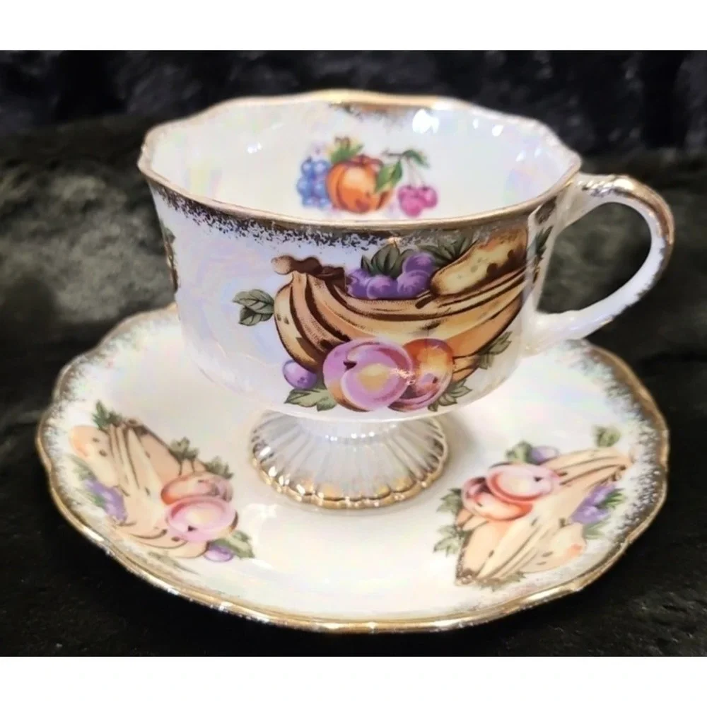 Lusterware Handpainted Fruit with gold finishings,‎ footed cup and saucer set